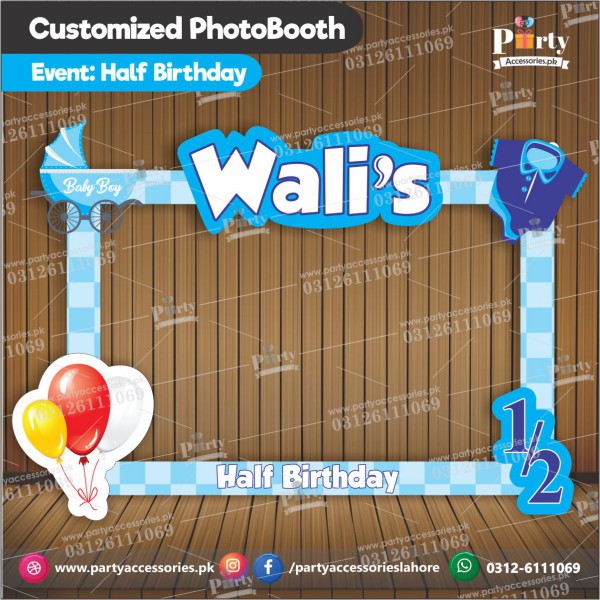 half birthday photobooth in blue color for boy 