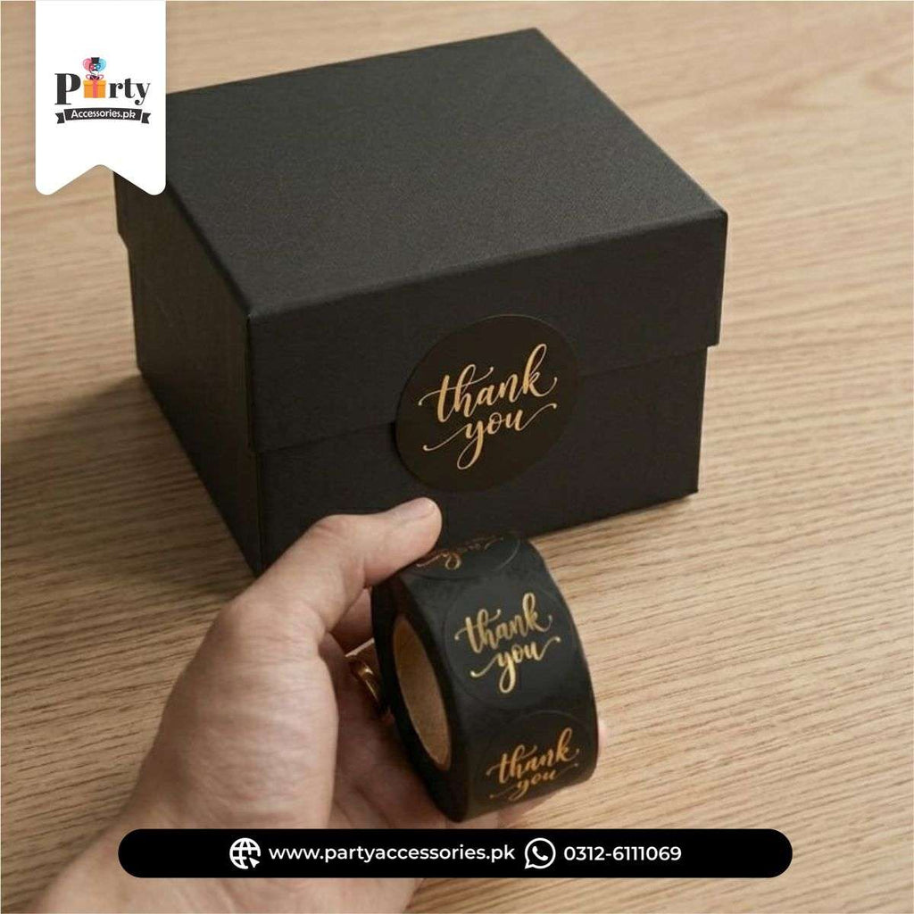 Black and golden thank you stickers for gift boxes