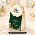 Two bag-style wedding favor boxes showing different printed designs