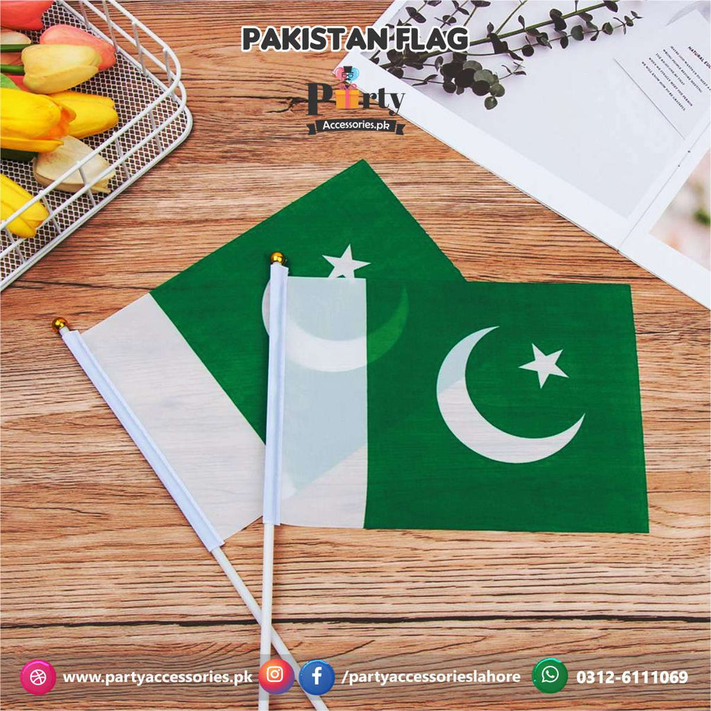 Pakistan Independence day celebrations hand flags 
