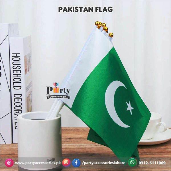 Pakistan Independence day celebrations hand flags 