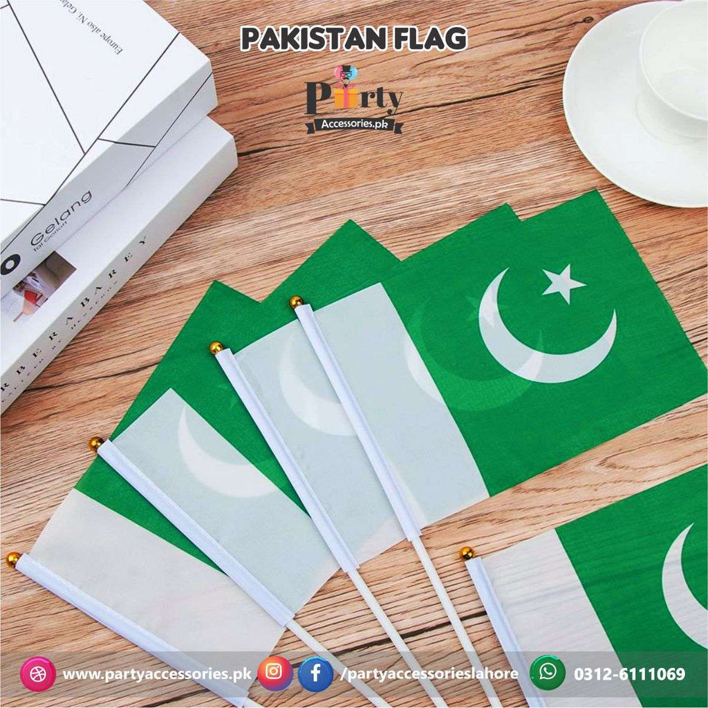 Pakistan Independence day celebrations hand flags 