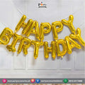 golden foil letters in happy birthday balloons 