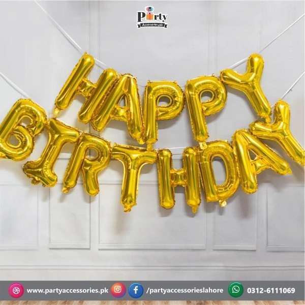 golden foil letters in happy birthday balloons 