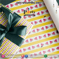 Gift wrapping sheets for One in a Melon theme birthday party | Yellow