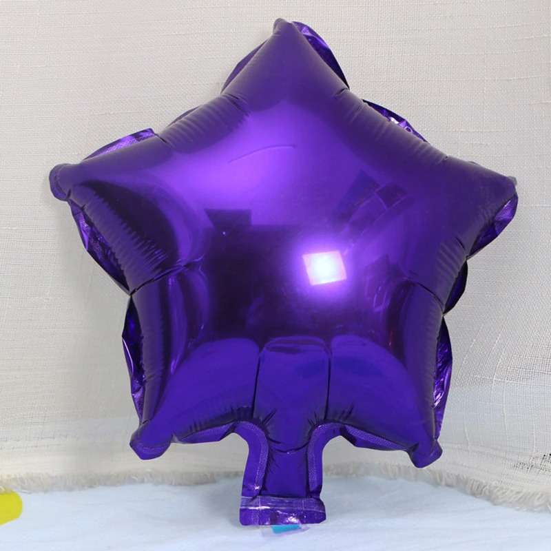 purple star shape foil balloon